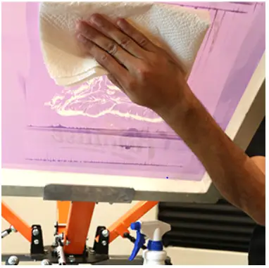 Use a towel to clean up residual plastisol ink